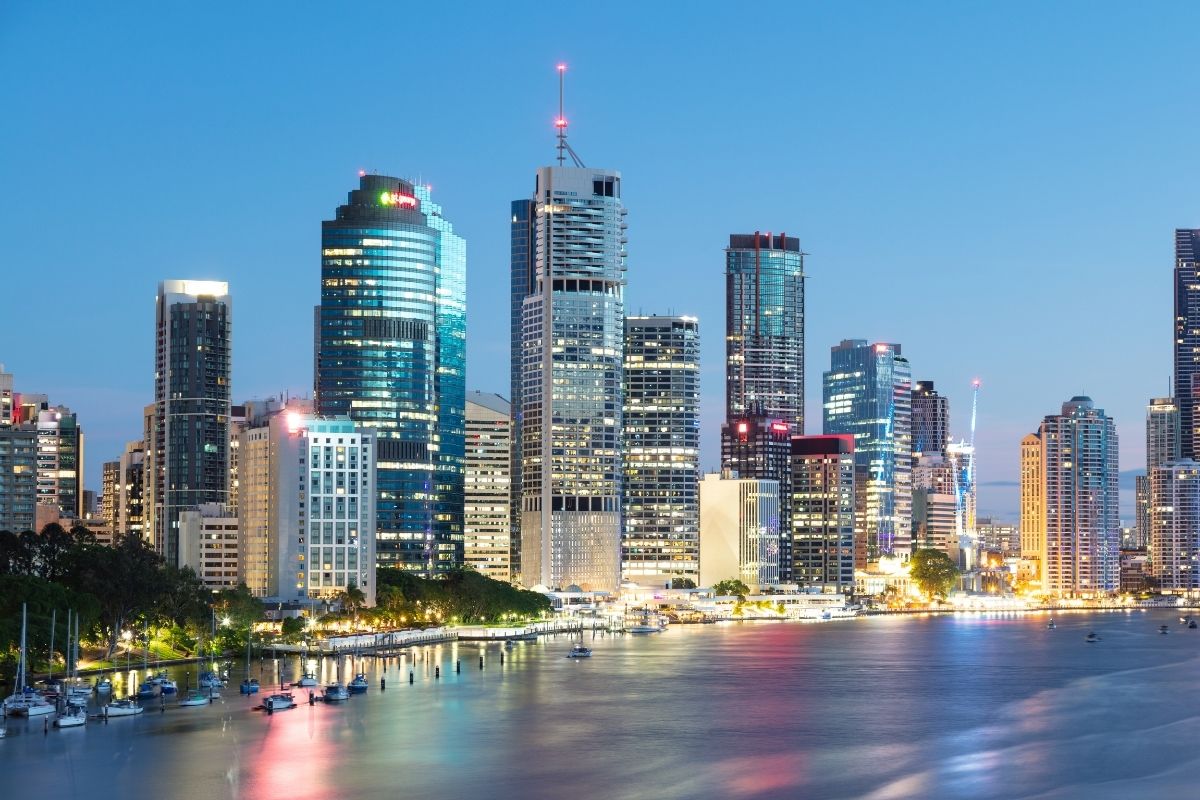 Brisbane city skyline along the river at dusk